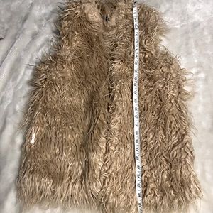 Women’s faux fur vest with silk lining. Large